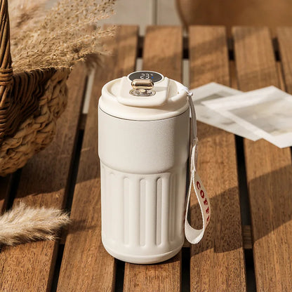 Thermos flask with temperature gauge