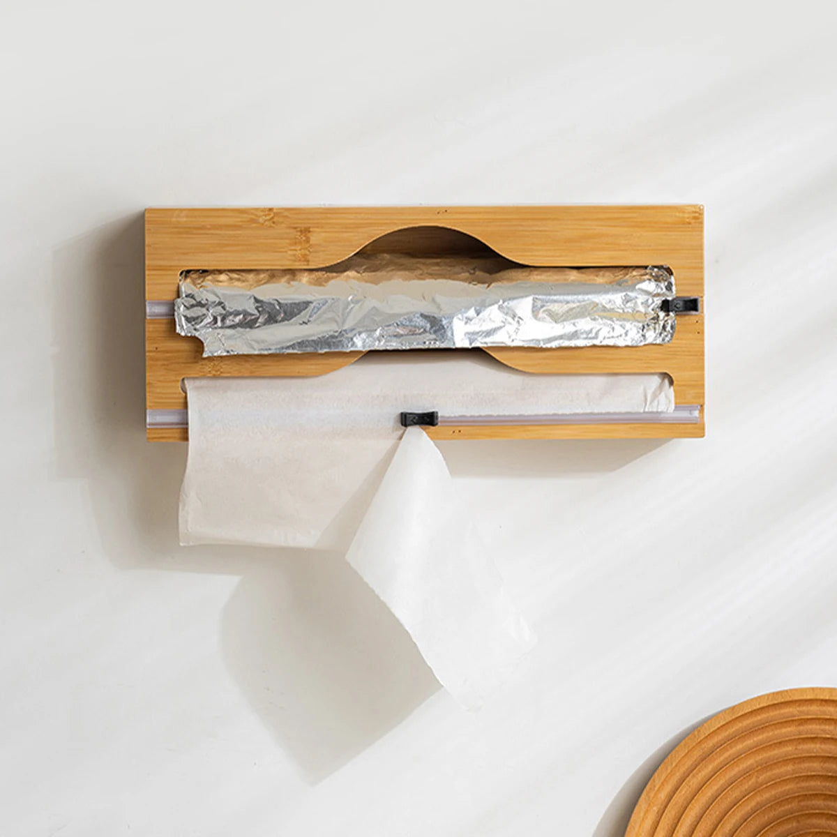 Plastic film dispenser for the kitchen