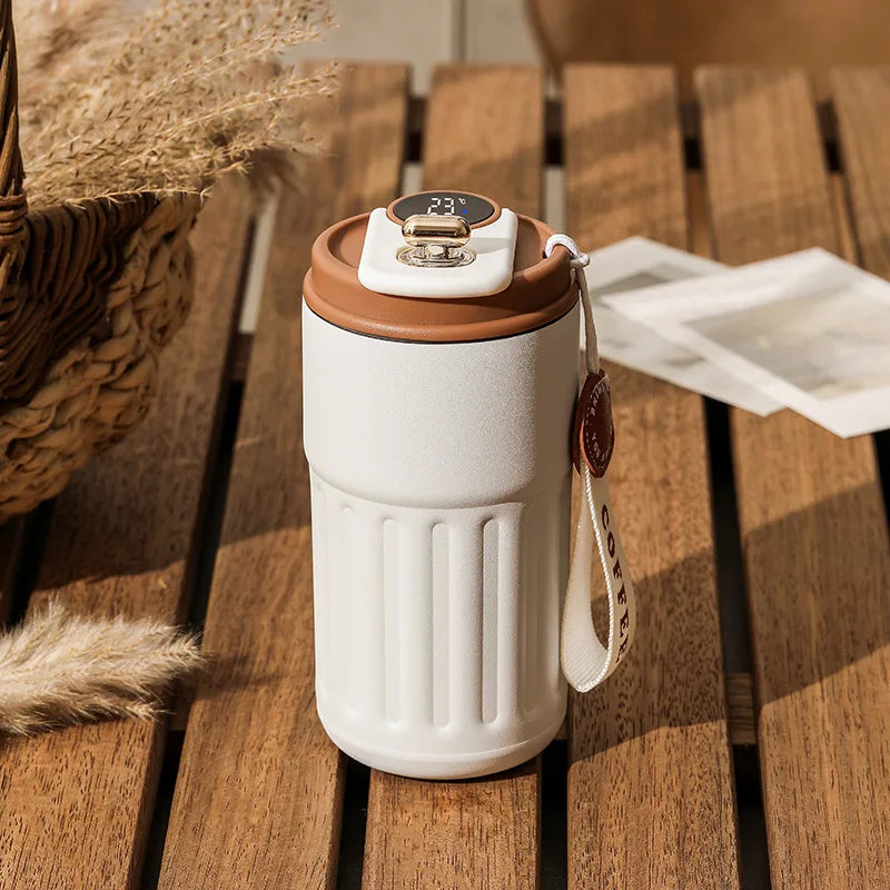 Thermos flask with temperature gauge