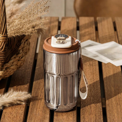 Thermos flask with temperature gauge