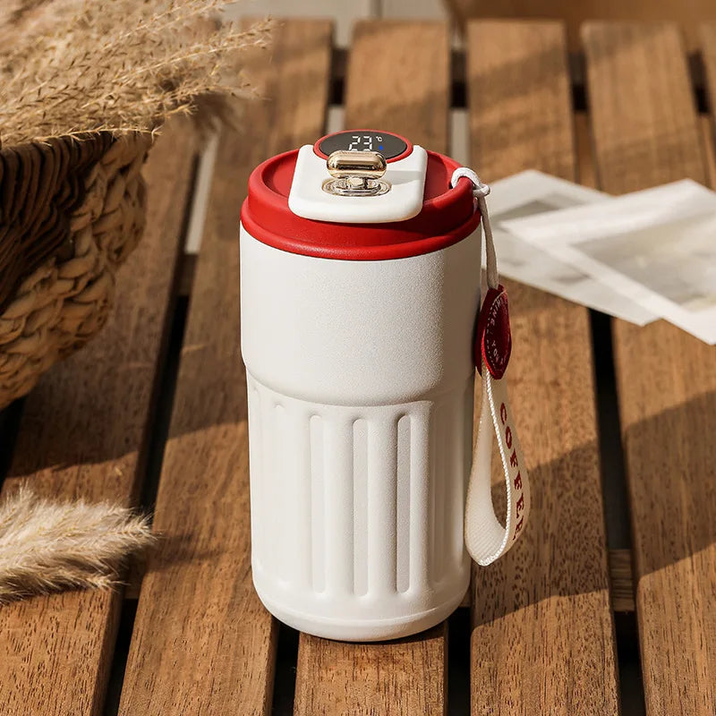 Thermos flask with temperature gauge